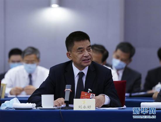  5月23日，全國政協(xié)委員劉永好在政協(xié)聯(lián)組會上發(fā)言。新華社記者 謝環(huán)馳 攝